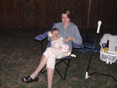 Amy with Emma in the garden