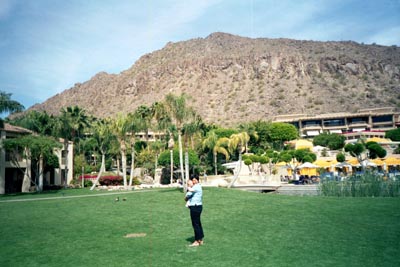 Nicole & Emma outside our room with Pool & Camel Back Mtn in the distance