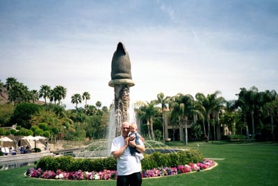 In front of the fountain by our room