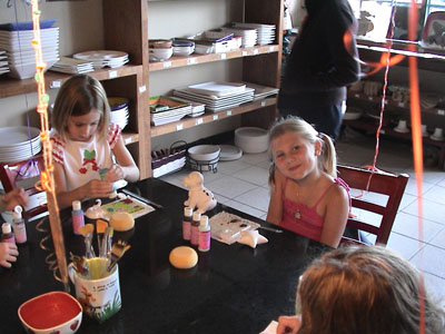 Emma at the table with friends