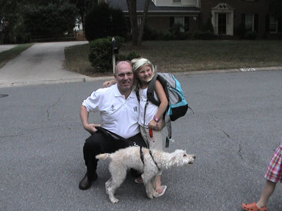 Stewart & Crumpet greet Emma returning home on her school bus