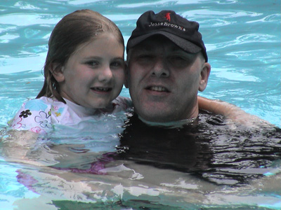 Emma and Stewart in the pool