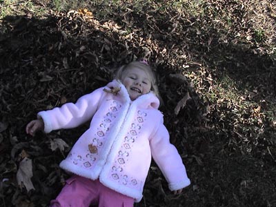 Emma really enjoys the garden and all the leaves