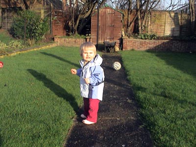 Emma playing in my mothers back garden