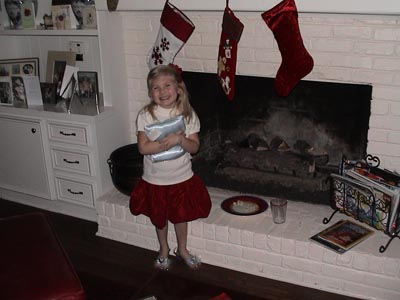 Emma by the fireplace