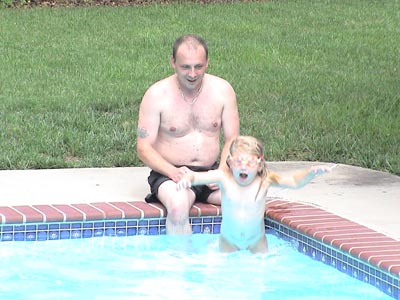 Stewarts brother Mark visits us from England, and playing with Emma in the pool