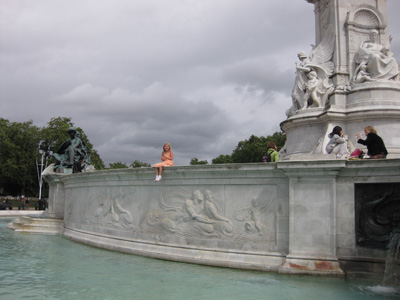 Emma seated at Queen Victoria Fountain