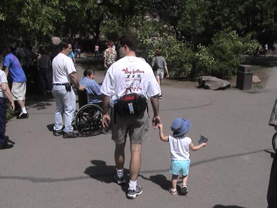 Mike Saber and Emma walking at the zoo - what a pair !