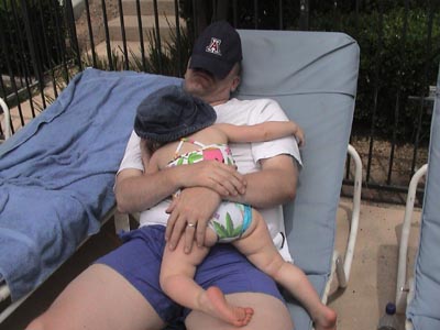 Stewart and Emma fast asleep for hours by the poolside