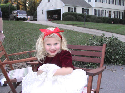 Seated at the street party for Halloween