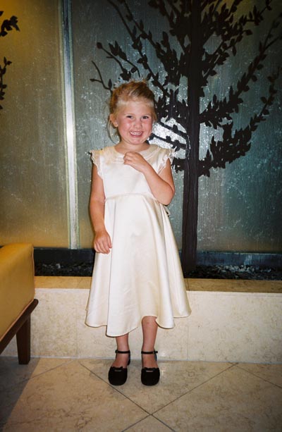 Emma showing off her outfit in the hotel lobby